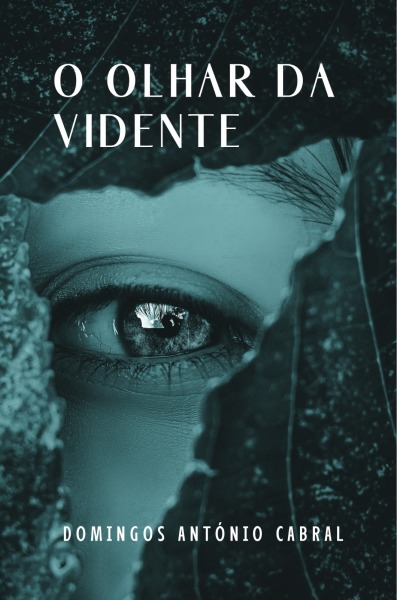 Capa do Livro O Olhar Da Vidente. Imagem de parte de um rosto feminino com um olho brilhante. Nome do autor: Domingos António Cabral